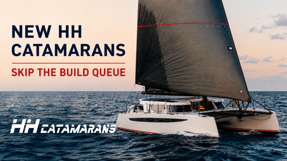 HH 60 catamaran under sail at sunset